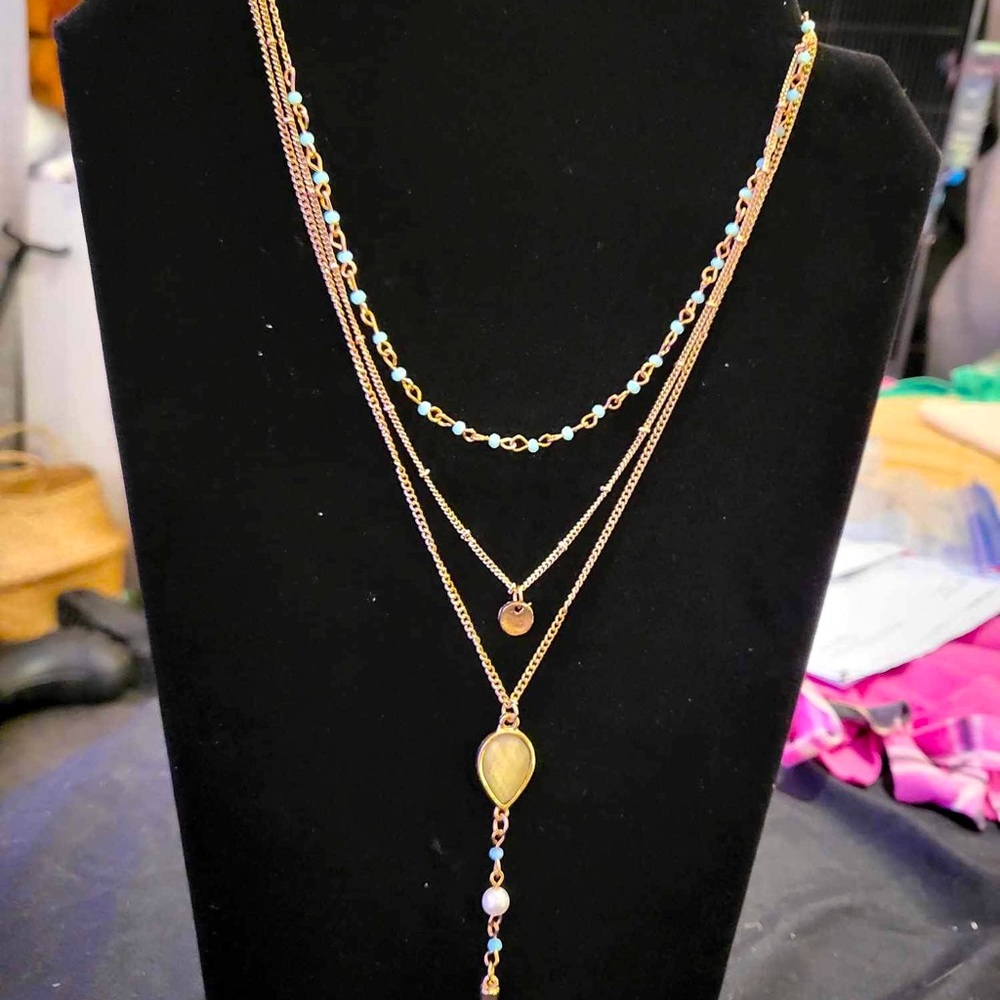 Gold tone muti layer necklace with pendant